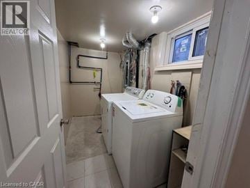 Hamilton apartment for rent - A laundry room with a washer and dryer.