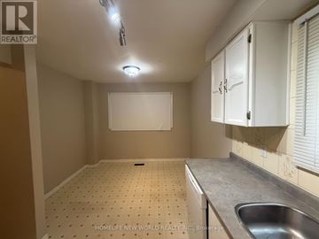Whitby (Lynde Creek) apartment for rent - A kitchen with a sink and cabinets.