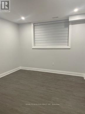 Toronto (Birchcliffe-Cliffside) apartment for rent - A room with a window covered by white blinds.