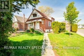 Hamilton (Sunninghill) apartment for rent - A house with the text RE/MAX REALTY SPECIALISTS INC., Brokerage in the foreground.