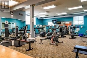 Collingwood townhouse for rent - A gym with a variety of equipment including treadmills, weights, and exercise machines.