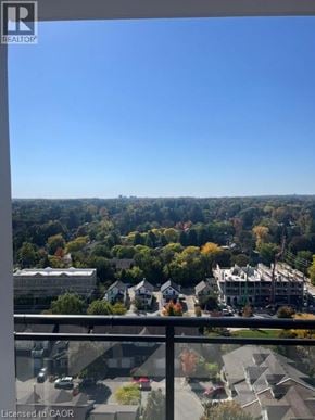 Waterloo condo for rent - A view from a balcony overlooking a residential area.