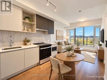 Oakville (Go Glenorchy) condo for rent - A modern kitchen with a dining table and chairs.