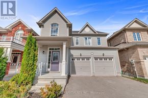 Georgina (Keswick South) apartment for rent - A house with a grey front yard and a garage door.