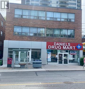Toronto (Humewood-Cedarvale) condo for rent - A Daniel's Drug Mart storefront with a sign that reads 1584.
