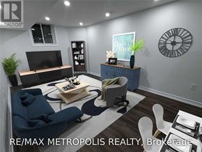 Whitby (Rolling Acres) apartment for rent - A living room with a blue sofa and a white chair.