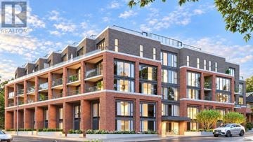 Toronto (Junction Area) condo for rent - A modern apartment building with a car parked in front.
