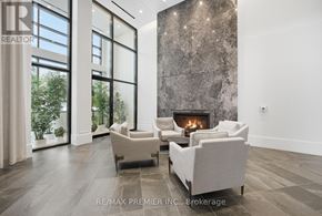 King (King City) condo for rent - A living room with a fireplace and a large window.