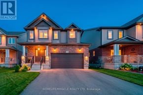 Stratford apartment for rent - A large, well-lit house with a driveway in front.