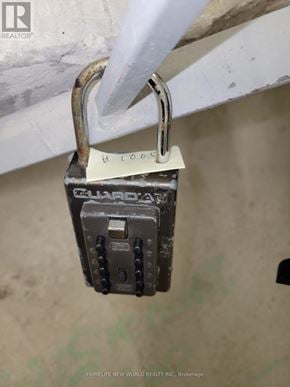 Toronto (Tam O'shanter-Sullivan) condo for rent - A padlock with the word Brokerage written on it.
