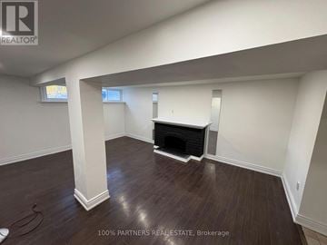 Newmarket (Bristol-London) apartment for rent - A room with a fireplace and a window.