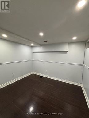 Brampton (Fletcher's West) apartment for rent - A room with wooden flooring and white walls.