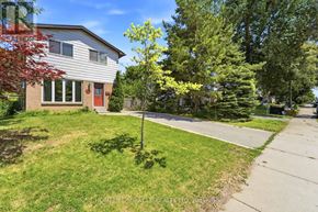 Hamilton (Gourley) apartment for rent - A house with a red door is for sale.