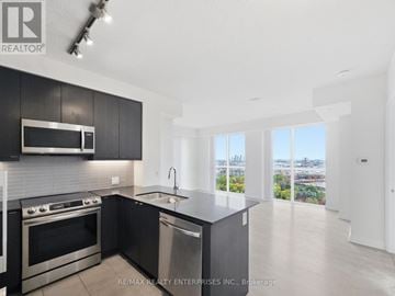 Toronto (Islington-City Centre West) condo for rent - A modern kitchen with a stainless steel dishwasher and oven.
