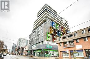 Toronto (Kensington-Chinatown) condo for rent - A tall building with a glass facade is in the center of the image.