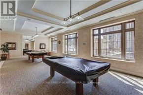 Toronto (Willowdale East) condo for rent - A room with a black mattress and a carpet with a Royal LePage Signature Realty logo.