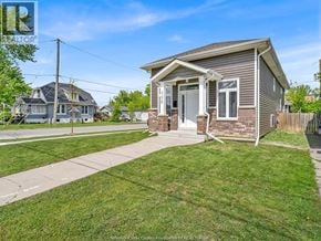 Tecumseh apartment for rent - A small house with a front porch is for sale in Winchester, Kentucky.