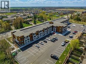 Binbrook apartment for rent - A spacious living room with a sofa set and a rug.