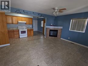 Windsor multi-family for rent - A kitchen with a white dishwasher and a white oven.