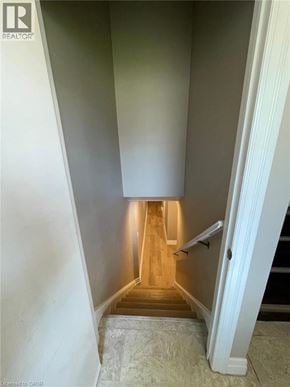 Kitchener apartment for rent - A hallway with a light at the end.