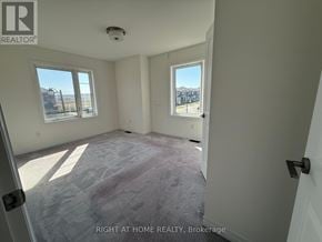 Brant (Paris) apartment for rent - A room with a carpeted floor and two windows.
