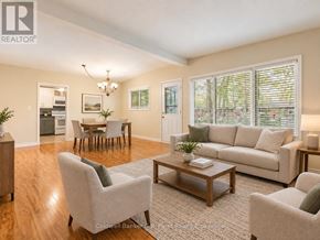 Tillsonburg apartment for rent - A living room with a couch, chairs, and a coffee table.