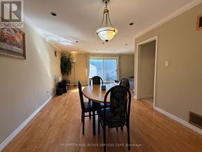 Toronto (L'amoreaux) townhouse for rent - A dining room with a table and chairs.