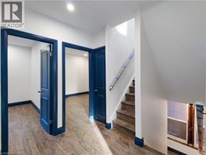 Hamilton apartment for rent - A room with a staircase and a door.