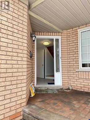 Mississauga (Central Erin Mills) apartment for rent - A white door is open to a hallway.
