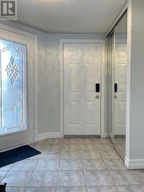 Mississauga (Central Erin Mills) apartment for rent - A white door with a glass window on the left and a mirror on the right.