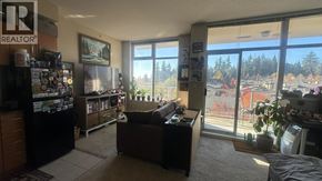 Burnaby apartment for rent - A living room with a couch and a television set.