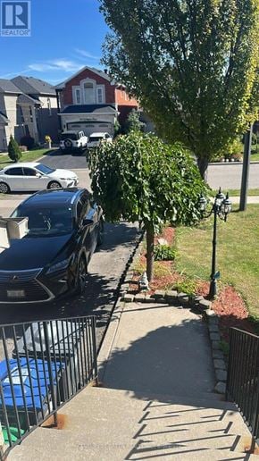 Mississauga (Cooksville) apartment for rent - A black Lexus is parked on a driveway.