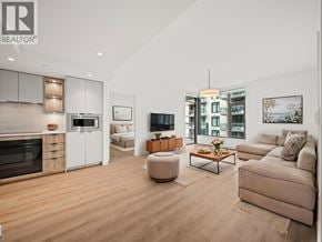 North Vancouver apartment for rent - A modern living room with a fireplace and a large window.