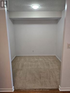 Toronto (Willowdale West) condo for rent - A room with a carpet floor and white walls.