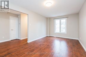 London North (North F) townhouse for rent - A room with wooden floors and white walls.