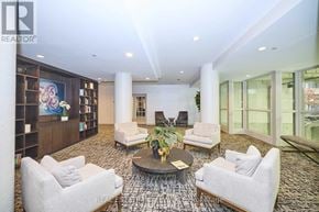 Toronto (Cabbagetown-South St. James Town) condo for rent - A living room with a large rug and a coffee table.
