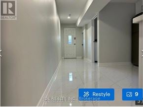 Toronto (Pleasant View) apartment for rent - A hallway with a white marble floor and a door at the end.