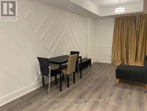 Oshawa (Windfields) condo for rent - A dining room with a table set for four.
