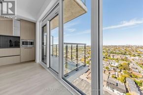 Toronto (Dovercourt-Wallace Emerson-Junction) condo for rent - A modern kitchen with a view of the city.
