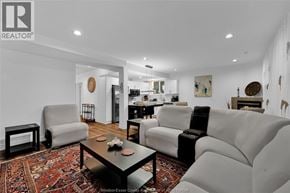 Lasalle apartment for rent - A living room with a grey couch, a coffee table, and a rug.