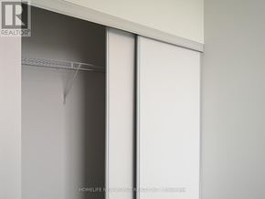 Toronto (Henry Farm) condo for rent - A white closet with a shelf and a white door.
