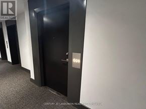 Richmond Hill (South Richvale) condo for rent - A black door with a gold number 501 on it.