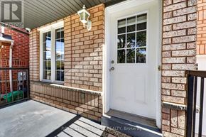 Brampton (Fletcher's Meadow) apartment for rent - A white door is on the right side of a brick wall.