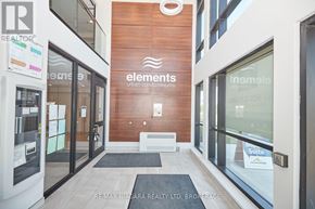 St. Catharines (Lakeport) condo for rent - The entrance to a building with a sign that reads "Elements Urban Condos".