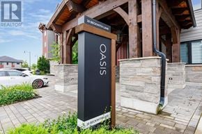 Blue Mountains condo for rent - A sign that says Oasis stands in front of a building.