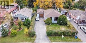 Aurora (Aurora Highlands) apartment for rent - A real estate brokerage sign is superimposed on an aerial view of a residential neighborhood.