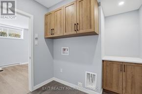 Hawkesbury apartment for rent - A brochure for Exit Realty in the middle of a kitchen.