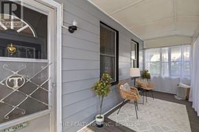 London East (East G) apartment for rent - A realtor's office with a grey wall and a white door.