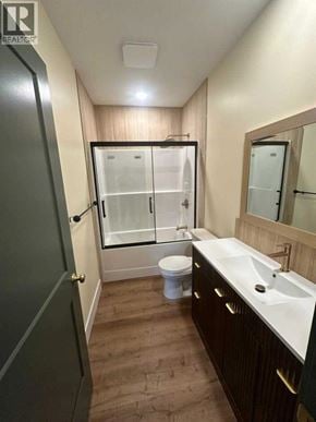 Blairmore apartment for rent - A bathroom with a sink, mirror, and shower.