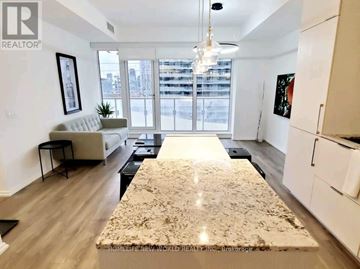 Toronto (Church-Yonge Corridor) condo for rent - A spacious living room with a large rug in the center.